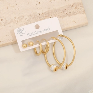 Detail view of 3-pair set with gold stainless steel ball studs and rhinestone earrings