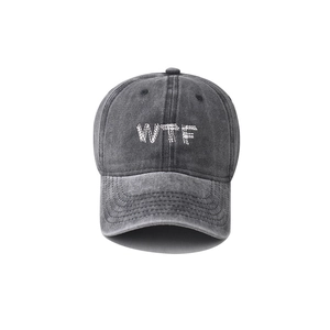 Washed vintage charcoal cotton baseball cap with WTF embroidery and curved brim