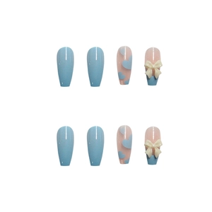 Blue and pink coffin press-on nails with 3D white bows and hand-painted hearts