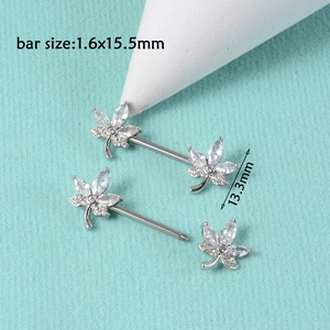 Detail of silver nipple barbells with leaf-shaped zircon studs and 1.6x15.5mm bar size