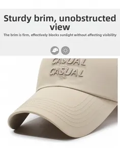 Close-up of curved brim and 3D embroidered CASUAL lettering on a breathable baseball cap