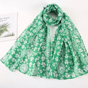 St. Patrick's Day green scarf with white clover print and floral pattern on soft voile fabric