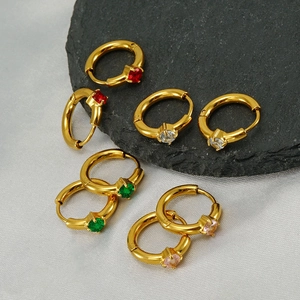 Detailed view of gold stainless steel hoop earrings with colorful round-cut gemstones