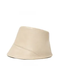 Side view of beige PU leather bucket hat with elegant diagonal stitching and smooth texture
