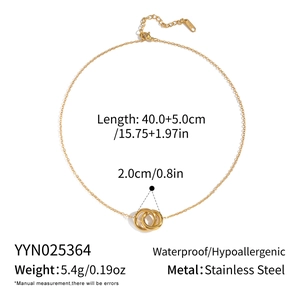 Detail showing interlocking geometric gold circles on a waterproof stainless steel necklace