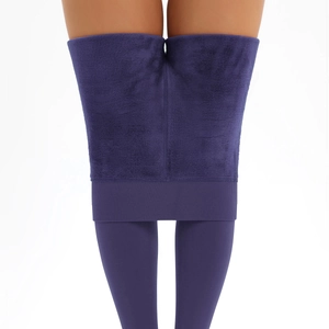 Close-up of thick purple fleece lining on high-waist thermal leggings for winter warmth