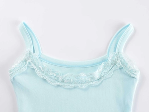 Detail of light blue camisole with delicate white floral lace trim and knit texture