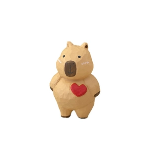 Hand-carved wooden capybara figurine with red heart detail for home desktop decoration