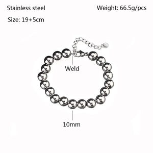 Detail of 10mm stainless steel beads bracelet with lobster clasp and extension chain