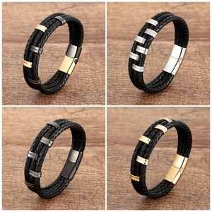 Detail view of multi-layer braided leather bracelets for men with various magnetic clasps