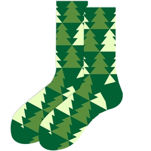 Detail of Christmas tree geometric patterns on deep green and cream cotton knit socks
