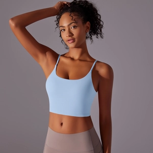 Detail of high-impact light blue gym vest with thin straps and supportive U-neck design