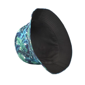 Tropical banana leaf print bucket hat with reversible black lining for sun protection