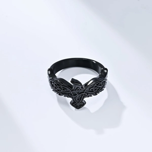 Close-up of vintage black stainless steel eagle ring with Celtic knot wing details