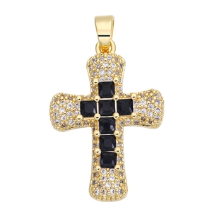 Macro view of gold-plated cross pendant with black zircon and white diamond pavé