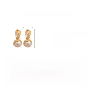 Detailed view of gold plated earrings featuring lace zircon and white pearl drop accents