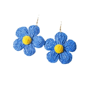 Handmade woven raffia flower earrings in blue and yellow colors with metal hooks