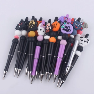 Colorful Halloween beaded pens featuring silicone pumpkin, skull, and bat characters