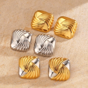 Three pairs of square stainless steel stud earrings with swirl texture in gold and silver