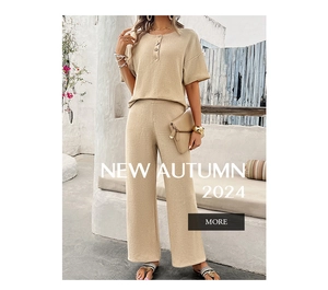 Detail view of beige waffle knit texture on loose fit short sleeve top and wide leg pants
