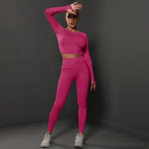 Detail of rose red seamless yoga set featuring thumb hole sleeves and high waist contour