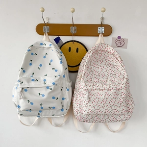 Floral canvas backpack in tulip and small flower patterns for casual school use