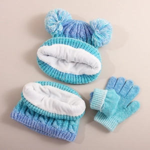 Detail of blue gradient knit set showing warm fleece lining in hat, scarf and gloves