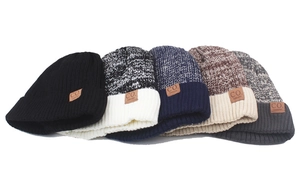 Multiple colors of winter knit beanies with fleece lining and premium leather patch