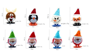 Set of 8 Christmas wind-up toys including reindeer, penguins and Santa with dimensions