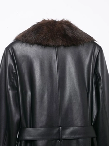 Detailed rear view of black faux leather coat with adjustable waist belt and fur collar