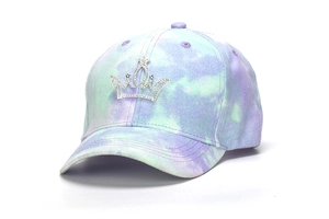 Detail of colorful tie-dye baseball cap with sparkling rhinestone crown patch decoration