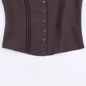 Front view of dark brown button-up top featuring fine pin-tucks and stylish puff sleeves