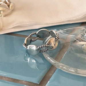 Minimalist double-layer 925 silver ring featuring polished discs and twisted rope details