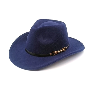 Detail of navy blue felt cowboy hat featuring black leather band and gold horsebit buckle