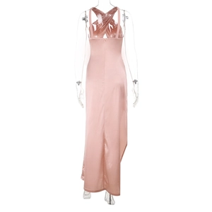 Detail of pink satin halter dress with criss-cross back and elegant side slit