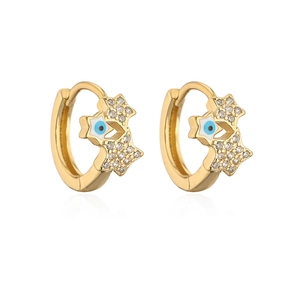 Star shaped gold earrings with blue evil eye charms and sparkling cubic zirconia crystals