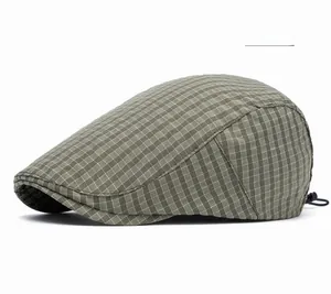 Detail view of military green plaid duckbill hat with adjustable drawstring toggle