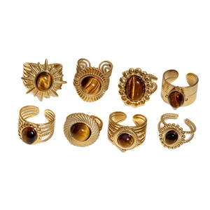 Collection of 18k gold plated stainless steel rings with natural tiger eye stones