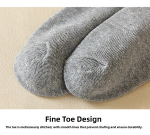Close-up of seamless gray knit sock toe showing high-quality stitching and cotton texture