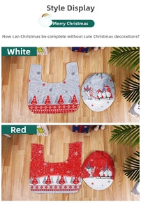 Detail view of Christmas toilet cover and U-shaped rug with snowman and tree patterns