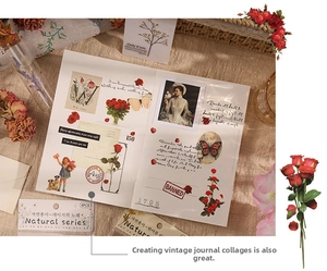 Close-up of vintage flower stickers with botanical roses and butterfly PET material