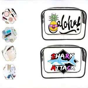 Transparent PVC toiletry bags with pineapple and shark prints for travel storage