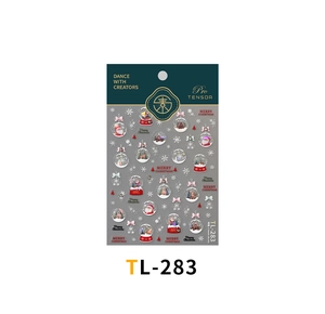 Detailed view of Christmas nail stickers with Santa, snowflakes, and gingerbread patterns