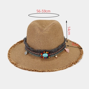 Bohemian high-top straw Panama sun hat with turquoise bead band and frayed edges