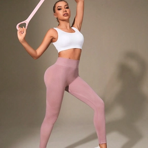 Ensemble de yoga femme avec brassière blanche et legging rose sans couture taille haute