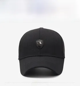 Detailed close-up of a black cotton baseball cap with a lion shield patch embroidery