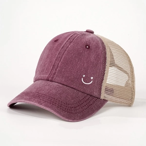 Vintage purple trucker hat with embroidered smiley face and breathable mesh back