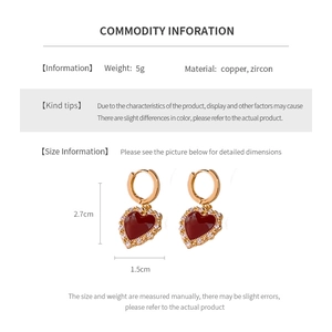 Detailed specs for gold plated heart drop earrings with dimensions of 2.7cm and 5g weight