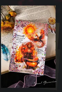 Macro detail of magic theme stickers with phoenix and witch designs on vintage book pages