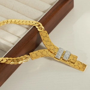 18k gold plated honeycomb pendant necklace with zircons on a beige velvet display box